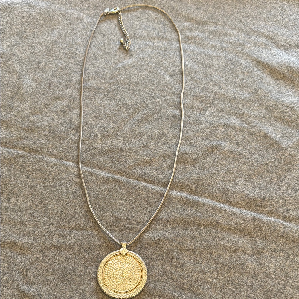 Elegant Gold and Silver Pendant Necklace